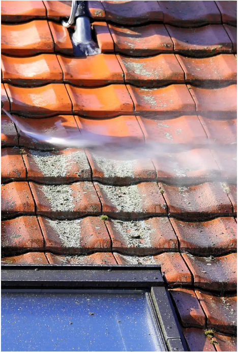 Pressure washing roof tiles close-up