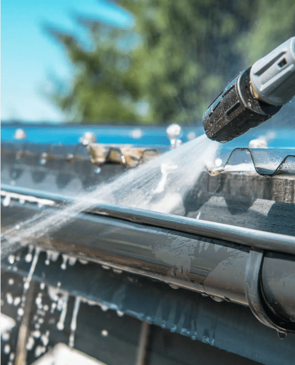 Power washing roof gutter system