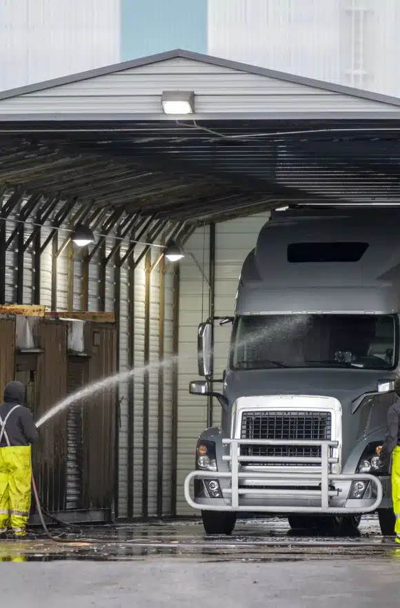 Semi-truck undergoing a thorough exterior wash