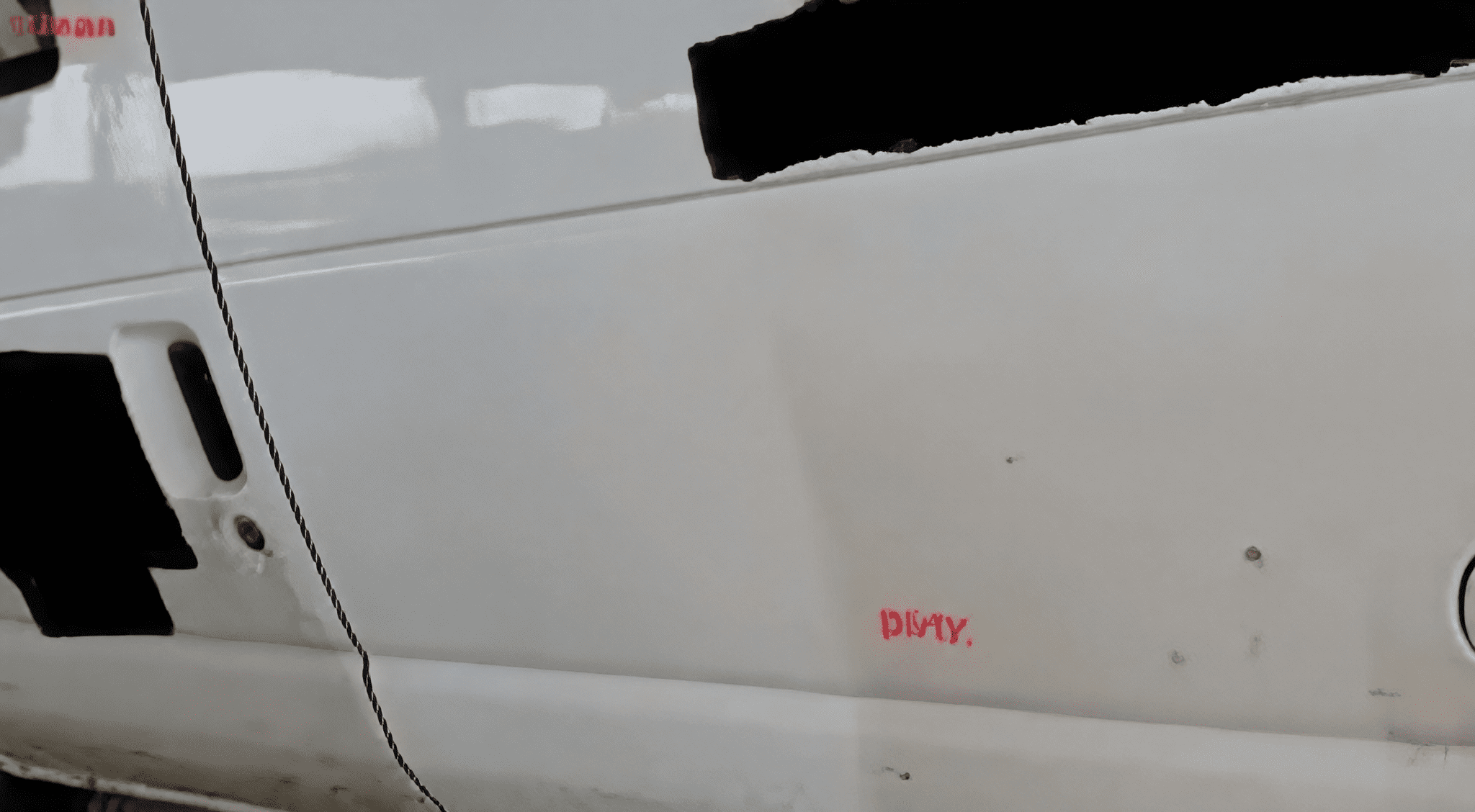 White van with "DIRTY" written on it
