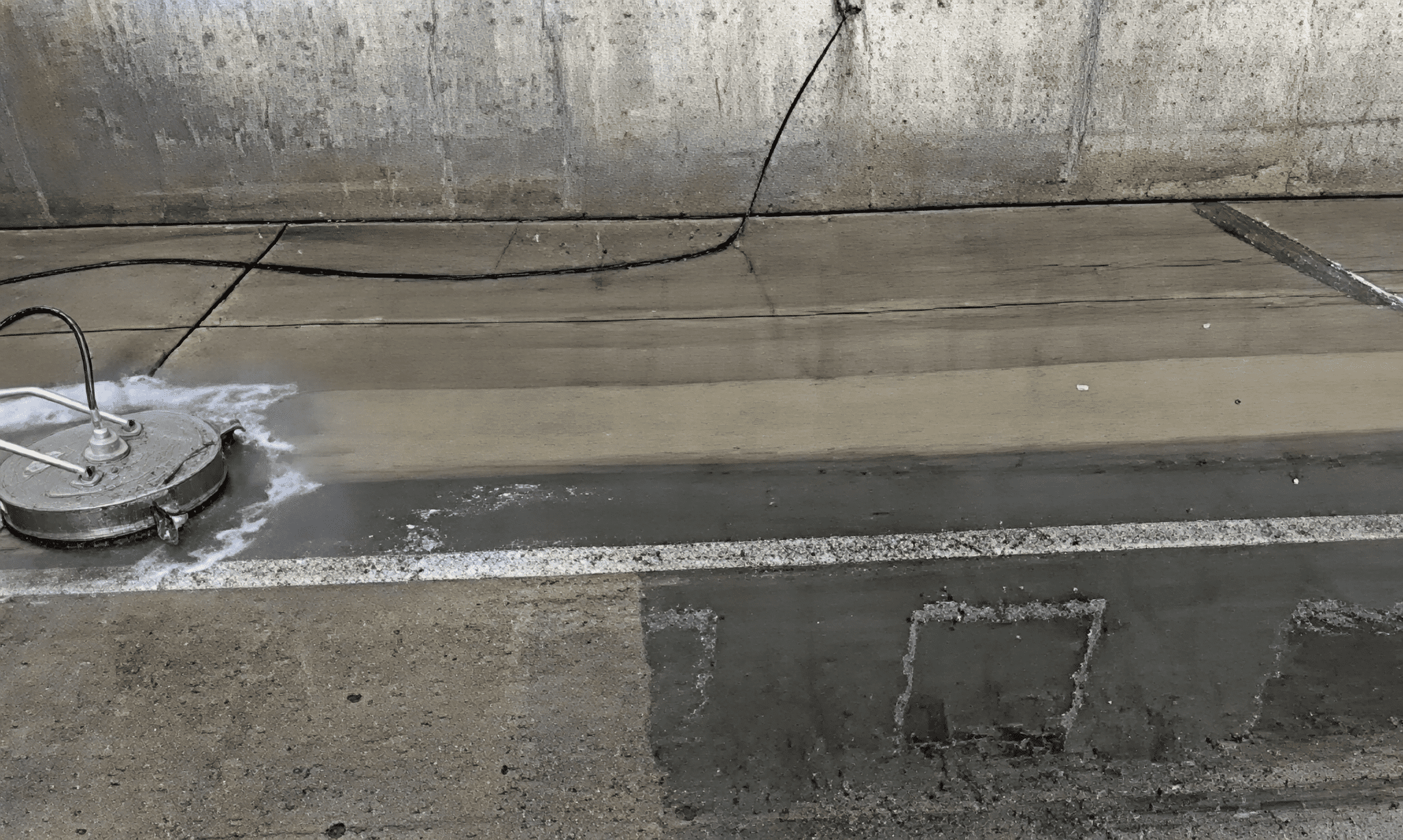 Industrial floor cleaning in progress