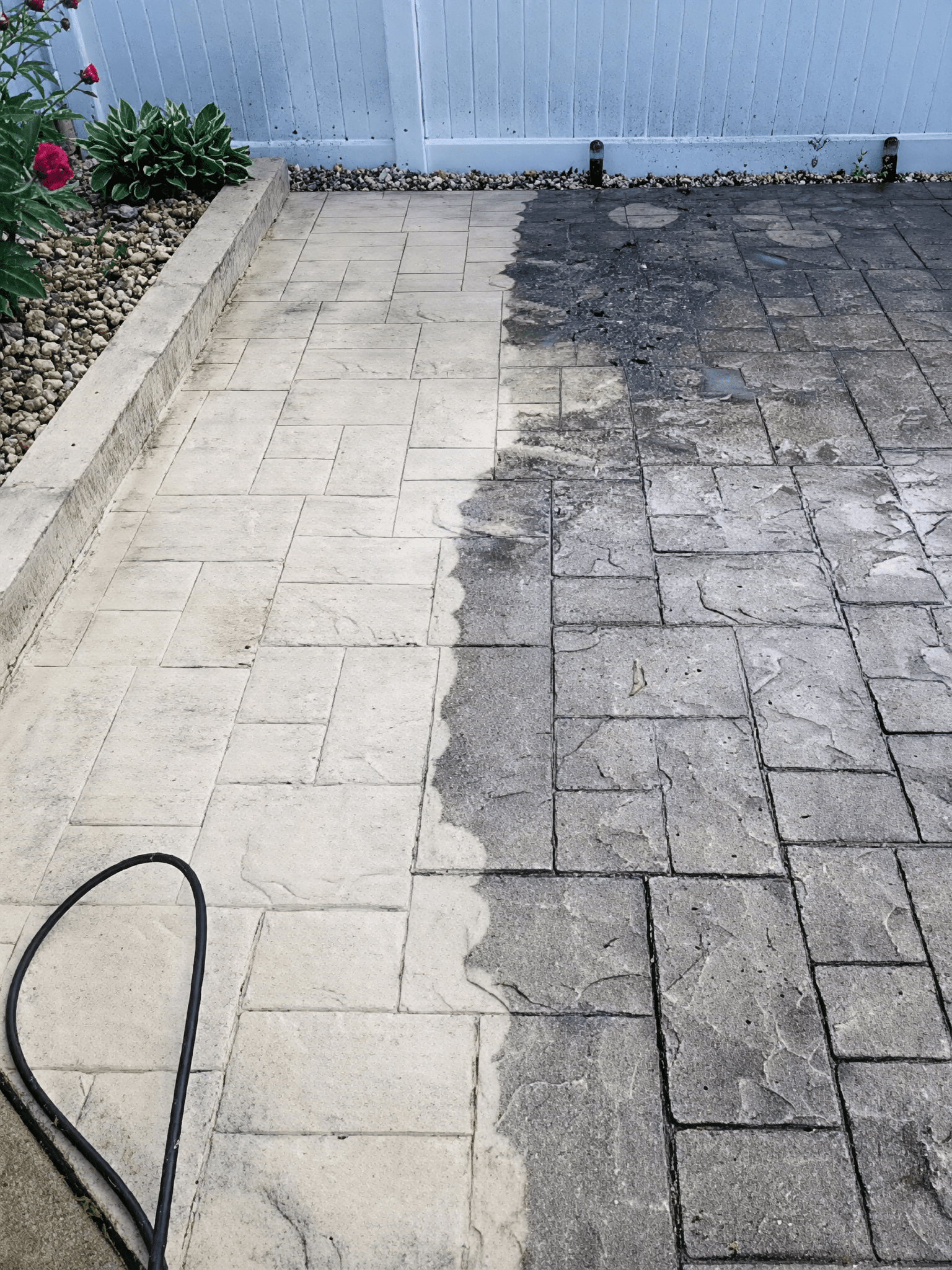 Patio cleaning in progress showing stark difference