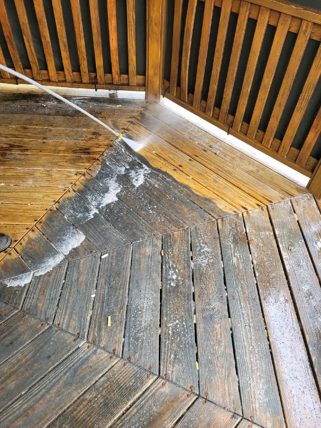 Restoring deck with pressure washing